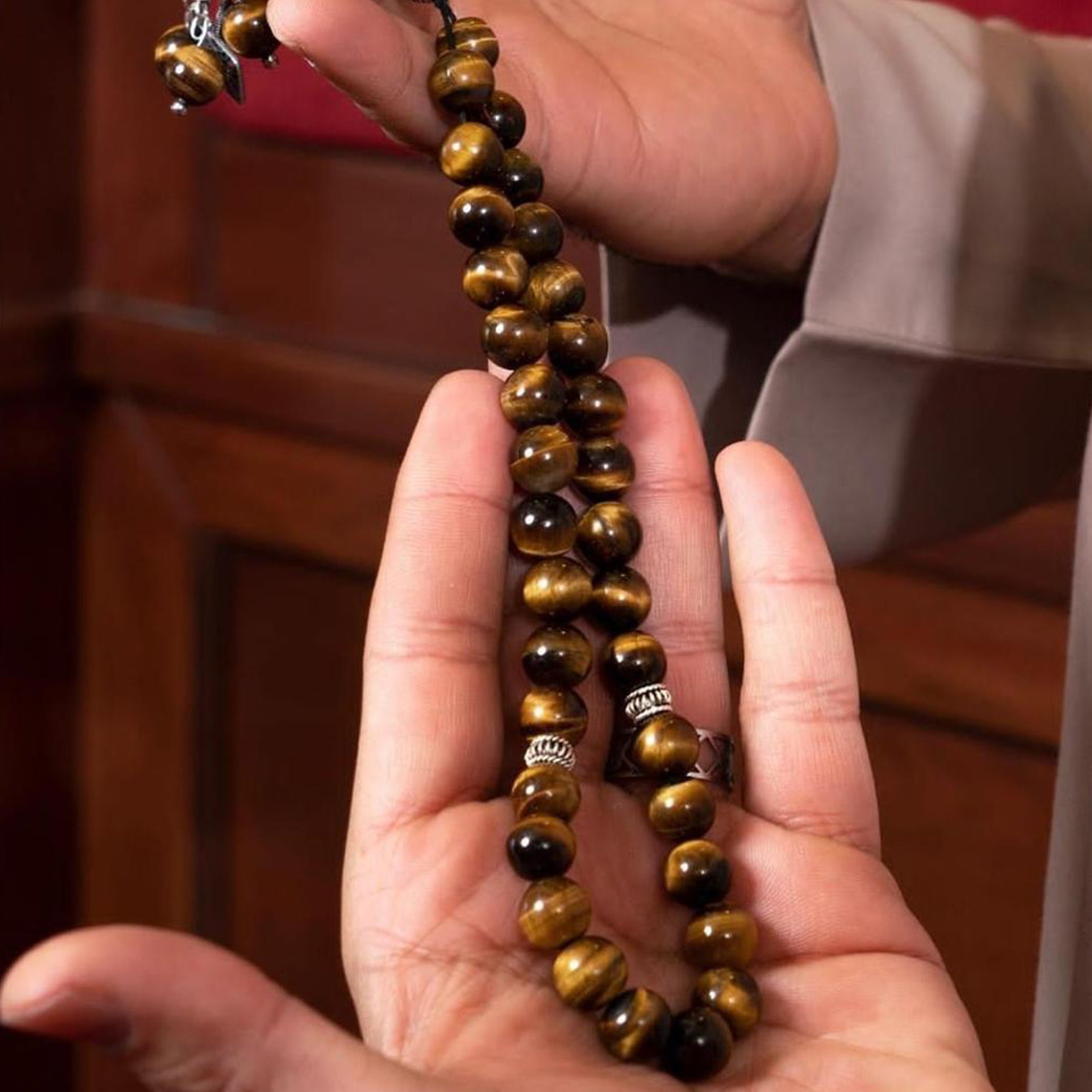 Tiger eye’s Stone Masbaha with Italian Silver Karkosha Design ‎
